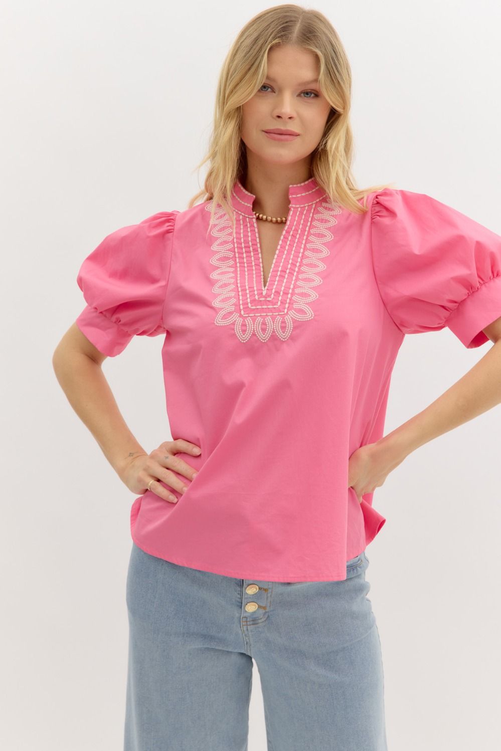 Women's pink puff sleeve blouse with embroidered V-neck detail – stylish cotton top for casual spring outfits, vacation looks, or weekend wear