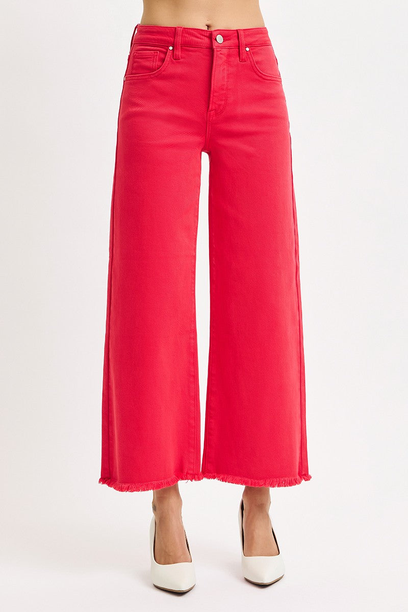 Red wide-leg jeans on a white background