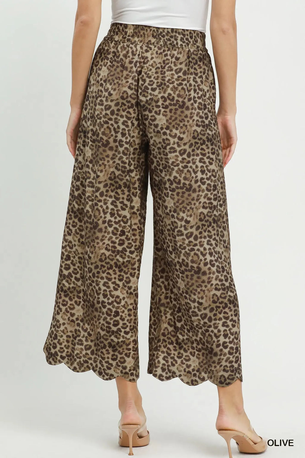 Leopard print wide-leg pants worn by a person on a white background