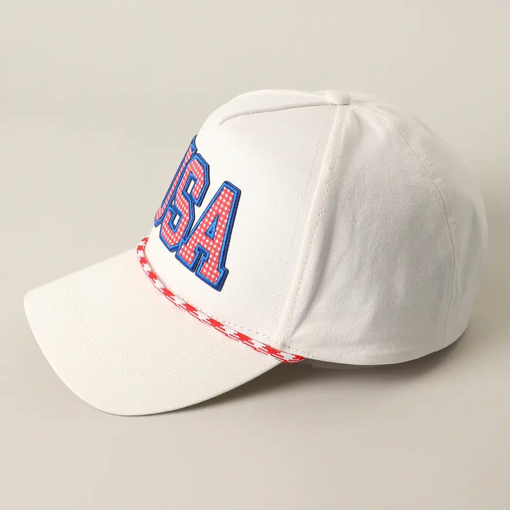 White cap with 'USA' text in red and blue on a light gray background
