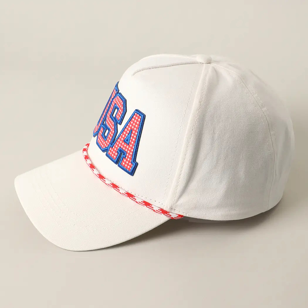 White cap with 'USA' text in red and blue on a light gray background