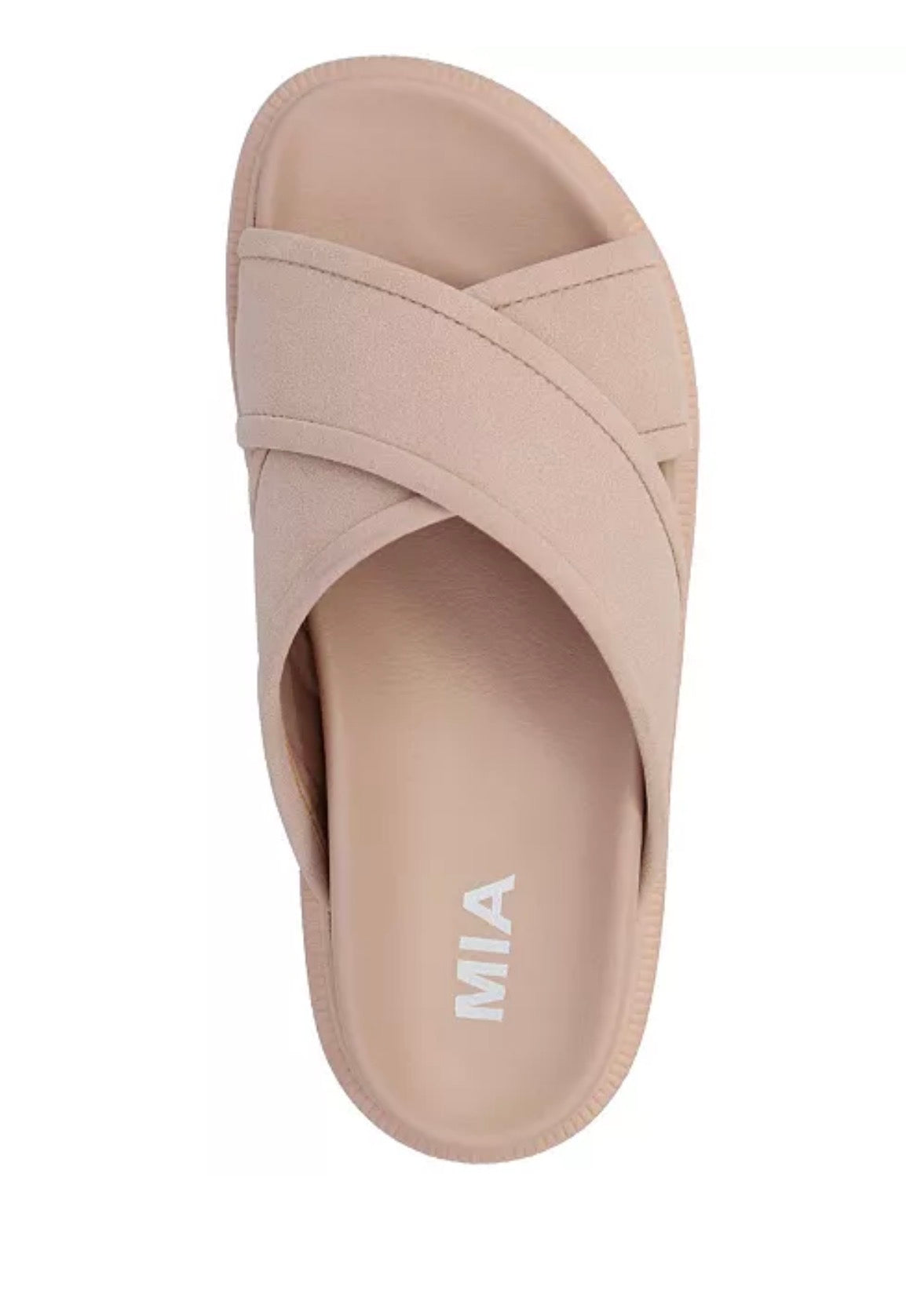 Beige sandal with criss-cross strap design on a white background