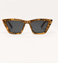Sunglasses with leopard print frame on a white background