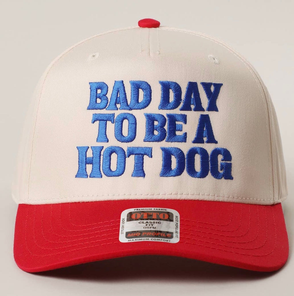 Cap with 'Bad Day to Be a Hot Dog' text on a plain background