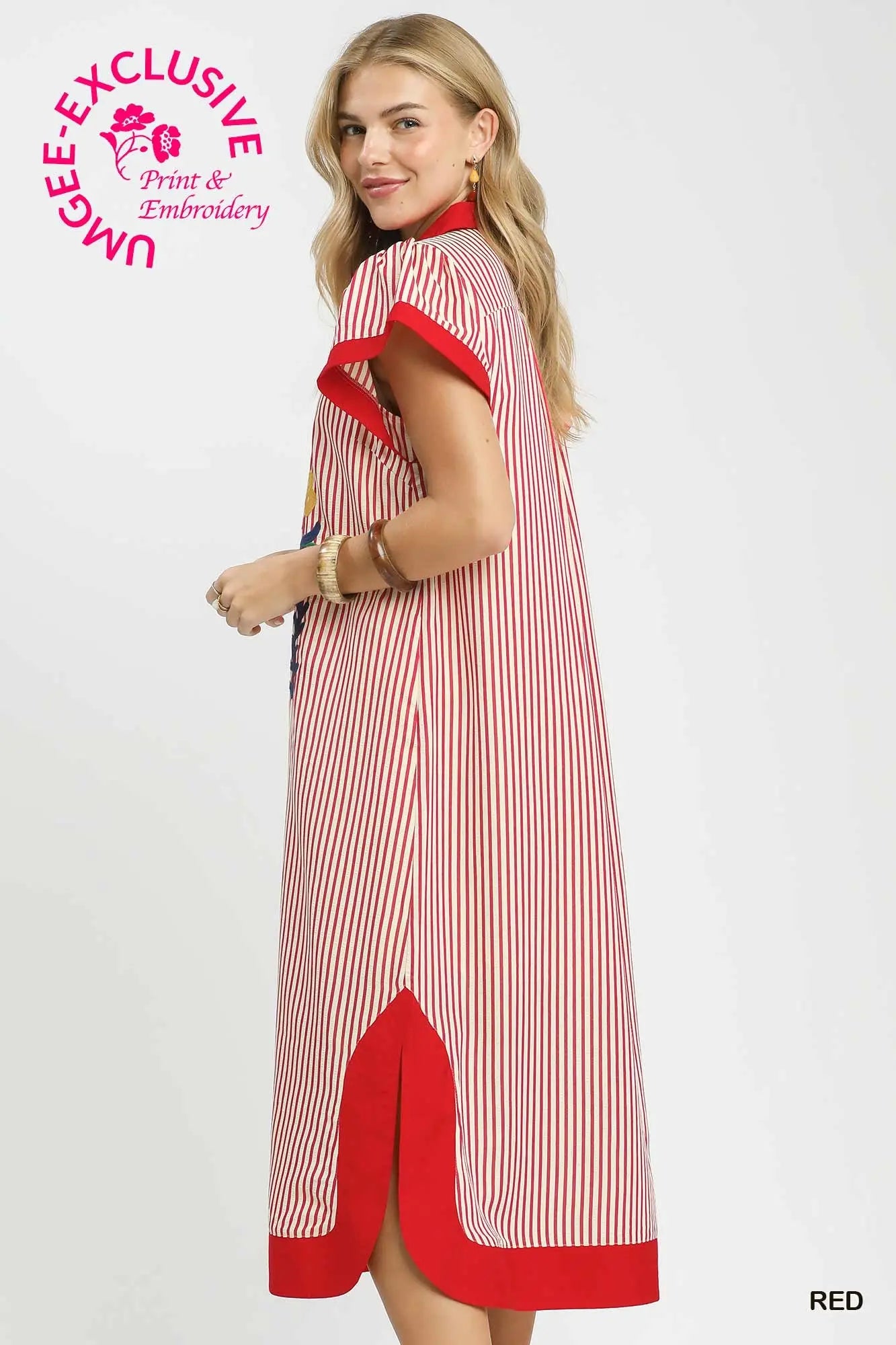 Woman wearing a red and white striped dress with 'UMEE Exclusive' branding on a white background.