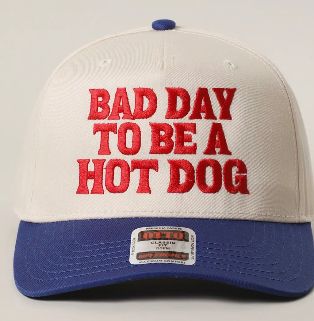 Cap with 'Bad Day to Be a Hot Dog' text on a white background