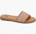 Tan sandal with woven strap on a white background