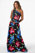 Woman wearing a black floral dress on a white background