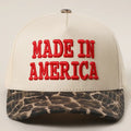 Cap with 'MADE IN AMERICA' text on a beige background
