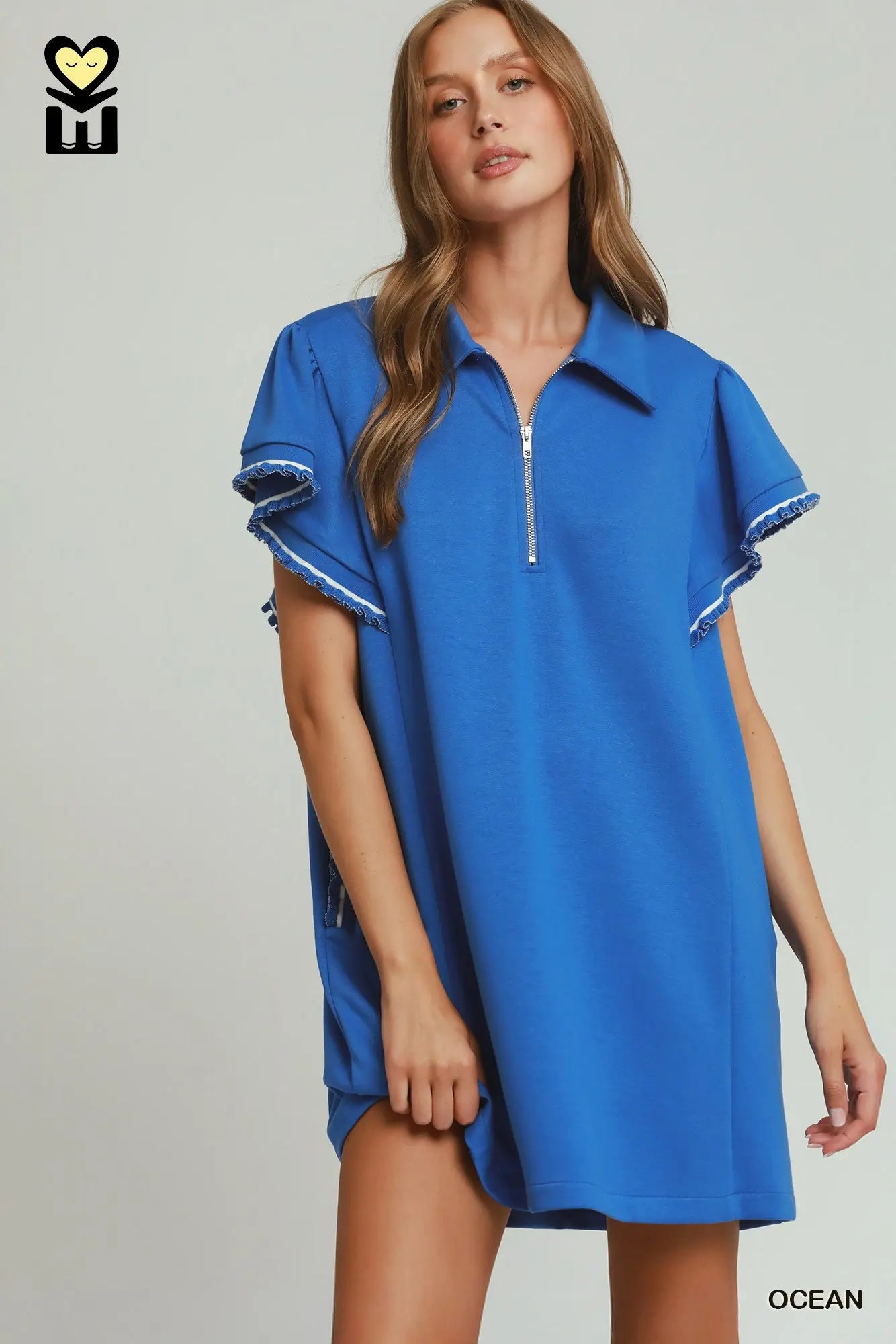 woman wearing blue dress