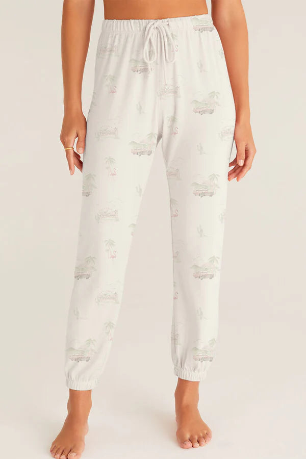 Light-colored pants worn by a person on a white background