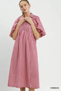 woman wearing red plaid dress
