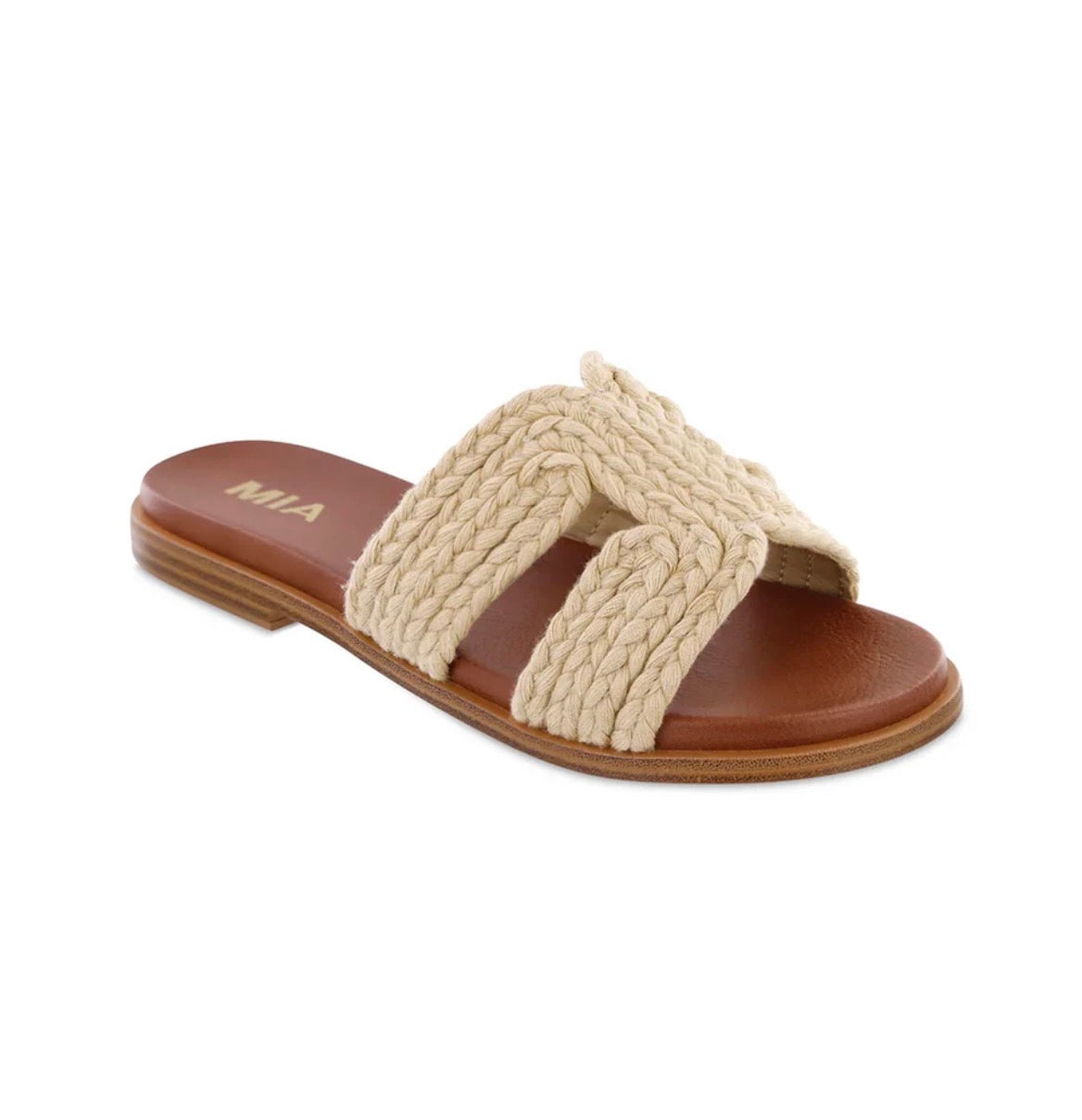 Beige sandal with braided design on a white background