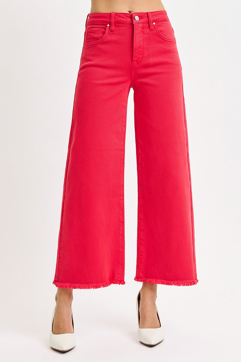 Red wide-leg jeans on a white background