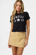 Woman wearing a black O'Neill t-shirt with a white star and text on a white background