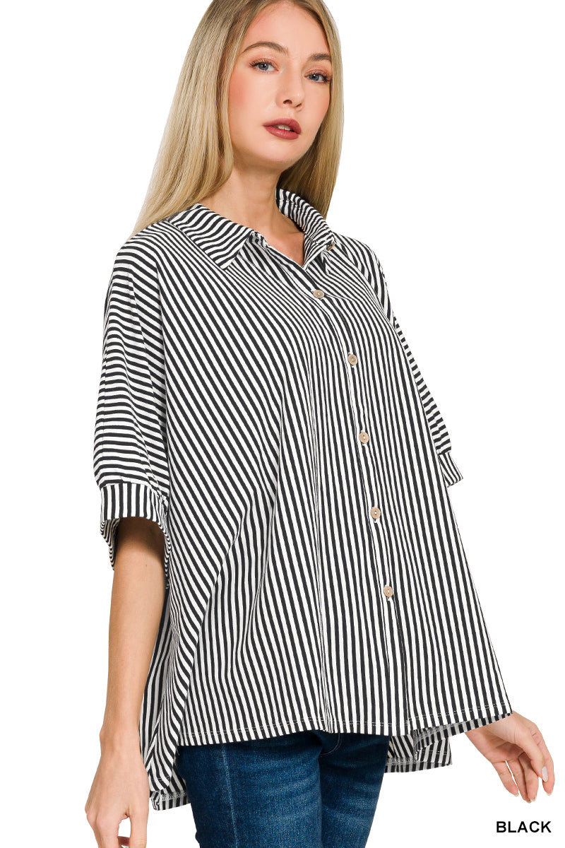 Woman wearing a black and white striped shirt on a white background