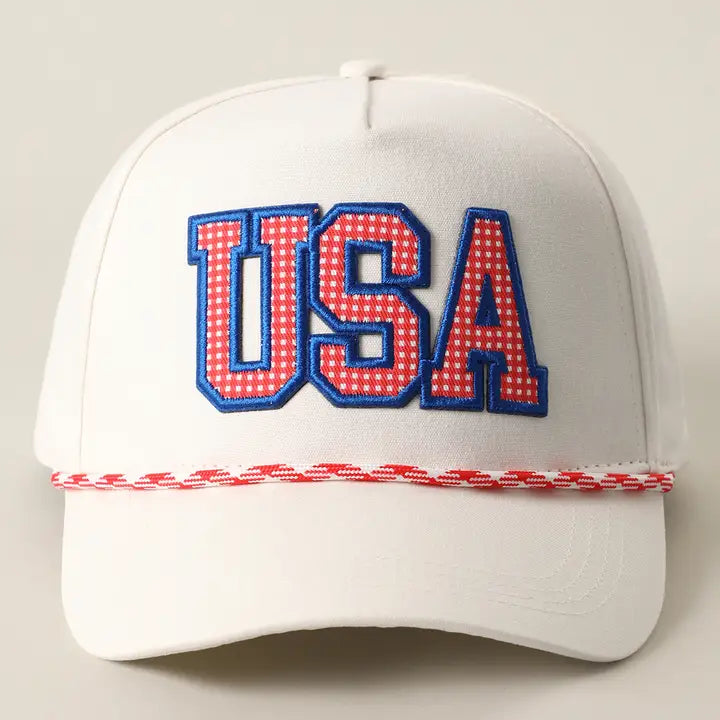 White cap with 'USA' in red and blue on a light gray background