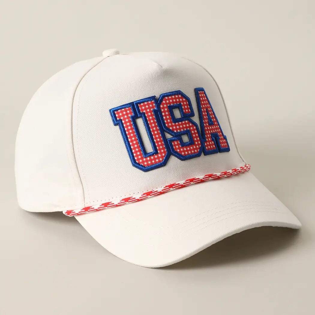 White cap with 'USA' text in red and blue on a light gray background