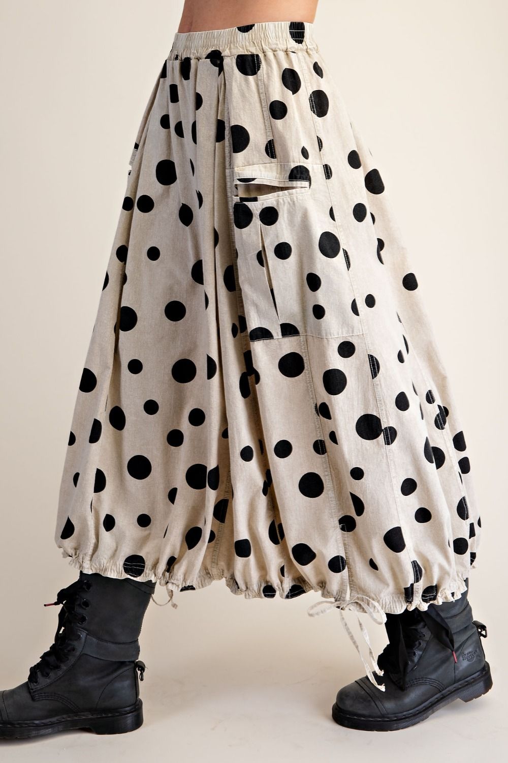 Polka dot pants with a neutral background